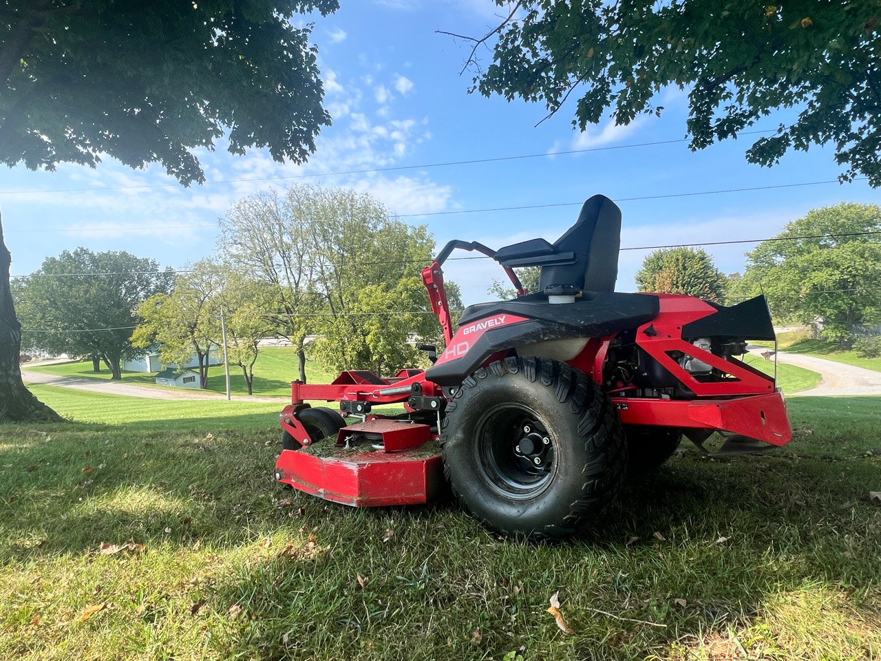 Close view of Clay’s red Gravely zero-turn mower on a finished lawn